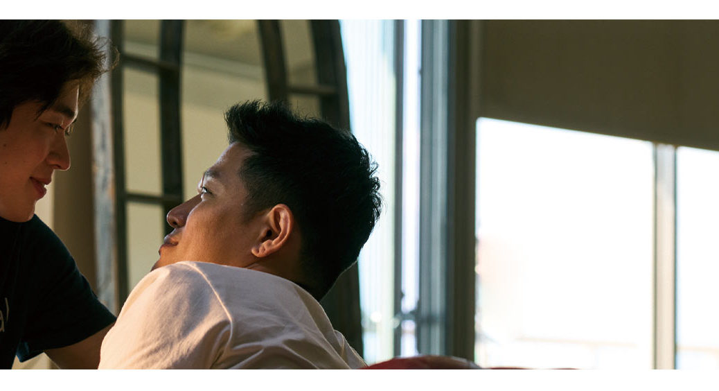 egoist movie screencap of kosuke and ryuta looking at one another