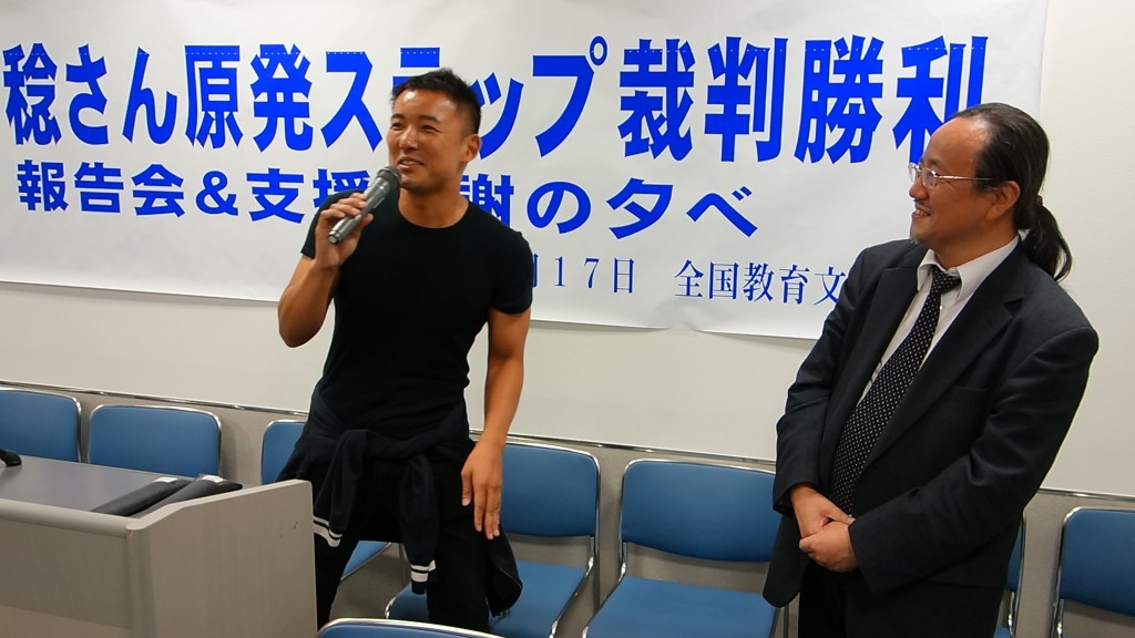 Taro Yamamoto, Diet Upper House Member and celebrity (left) celebrates victory for freedom of the press with journalist Minoru Tanaka (right) 